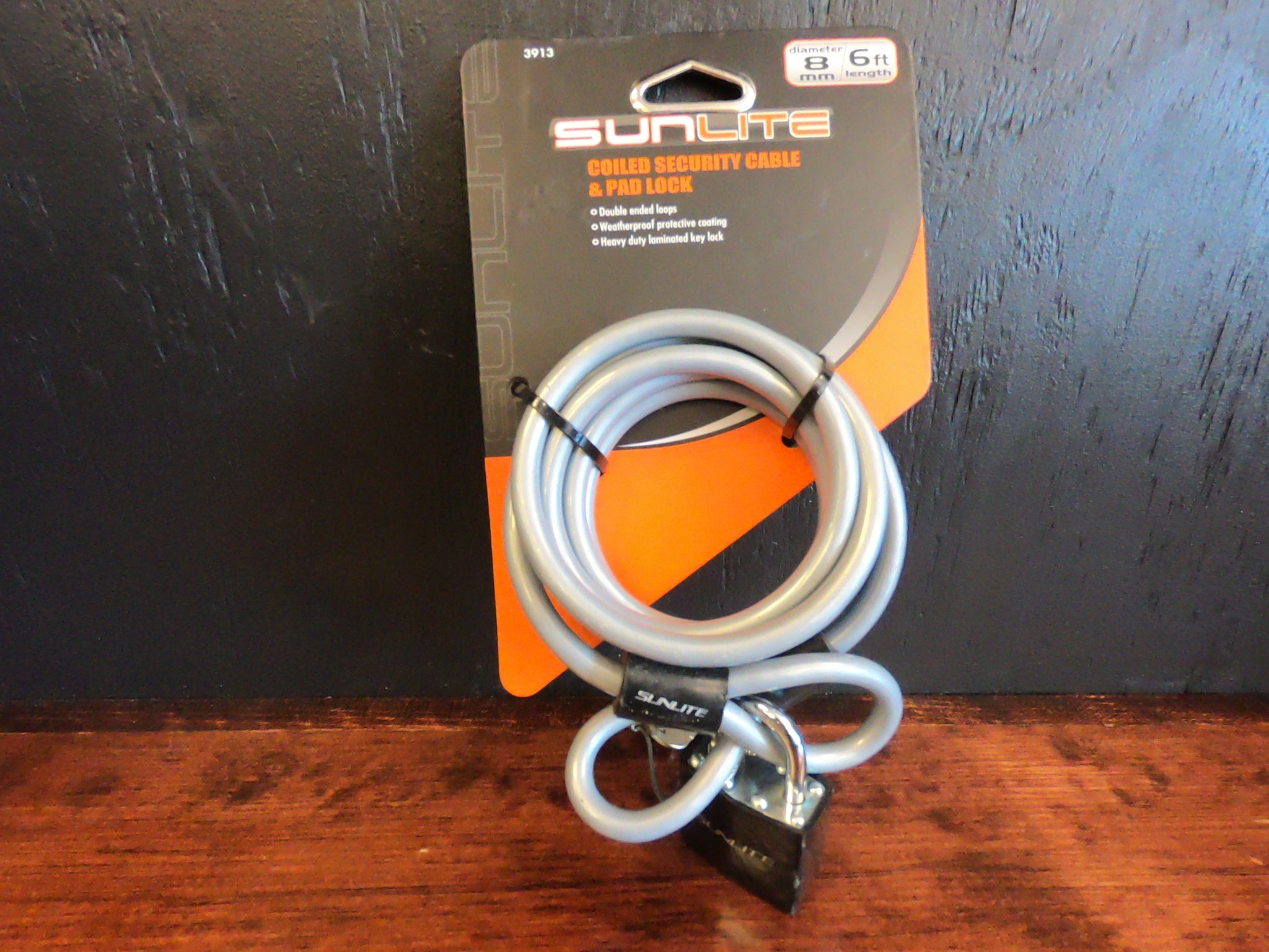 Sunlite coiled security cable & pad lock